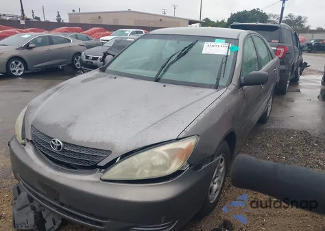 2004 Toyota Camry Le z USA, uszkodzony, nr VIN 4T1BE32K24U789868